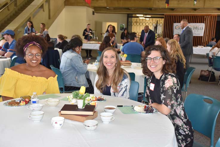 People enjoying Tea With the Deans