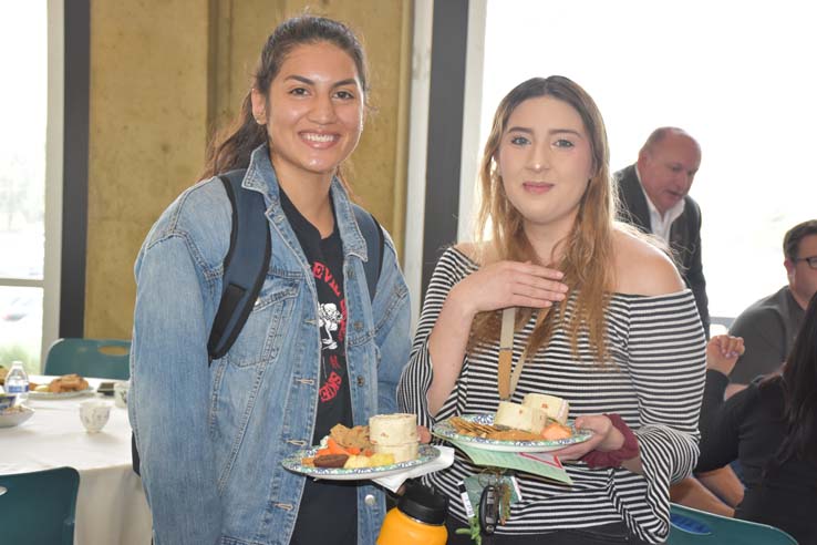 People enjoying Tea With the Deans