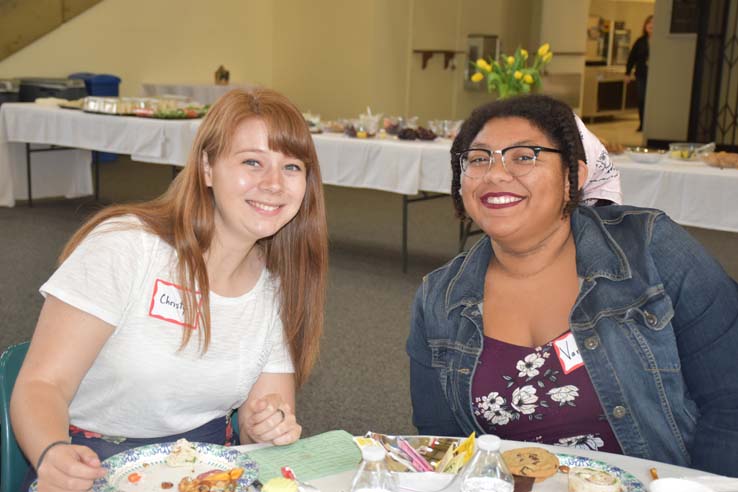 People enjoying Tea With the Deans