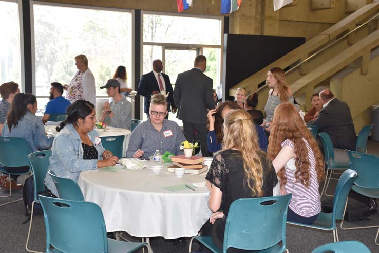 People enjoying Tea With the Deans