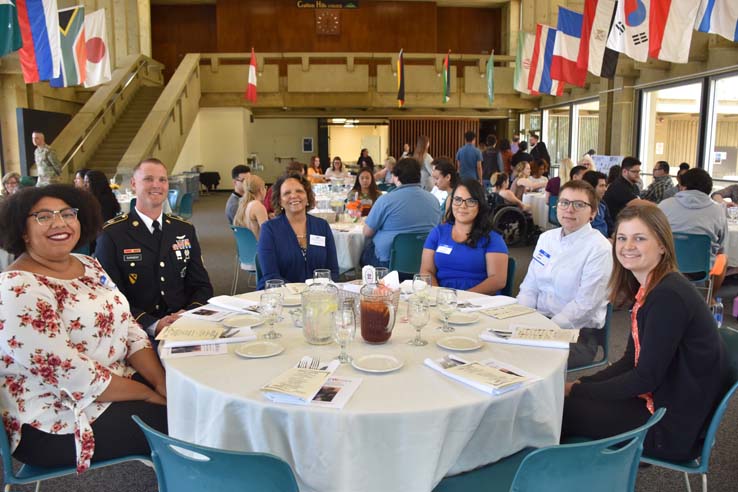 People enjoying the Etiquette Luncheon