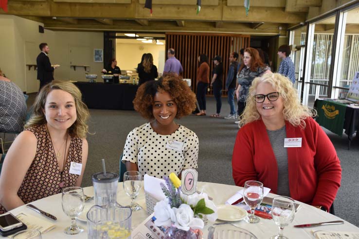 People enjoying the Etiquette Luncheon