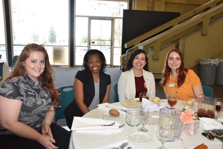 People enjoying the Etiquette Luncheon