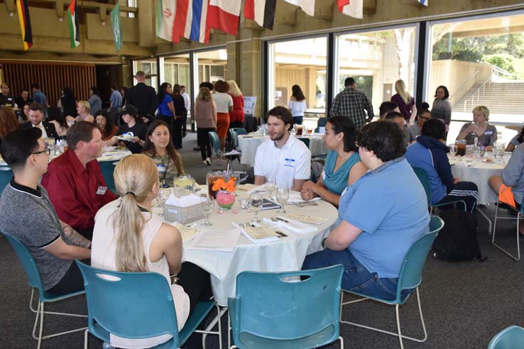 People enjoying the Etiquette Luncheon