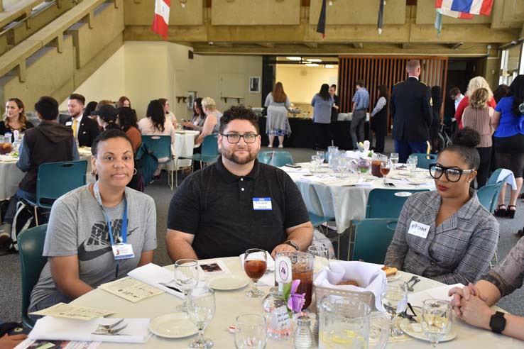 People enjoying the Etiquette Luncheon