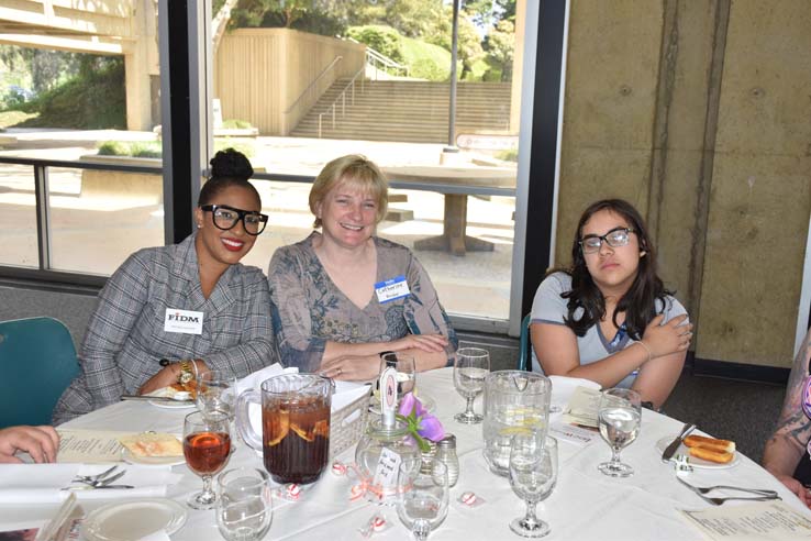 People enjoying the Etiquette Luncheon