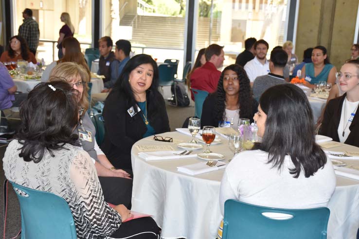 People enjoying the Etiquette Luncheon