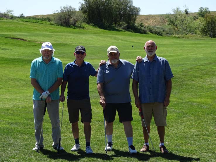 People enjoying the Fire Academy Golf Tournament