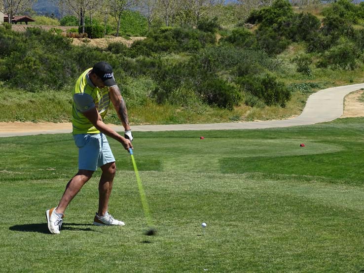 People enjoying the Fire Academy Golf Tournament