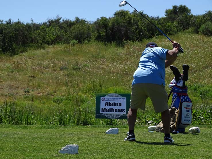 People enjoying the Fire Academy Golf Tournament