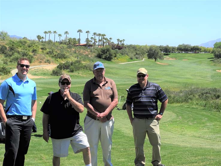 People enjoying the Fire Academy Golf Tournament