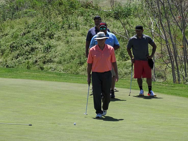 People enjoying the Fire Academy Golf Tournament