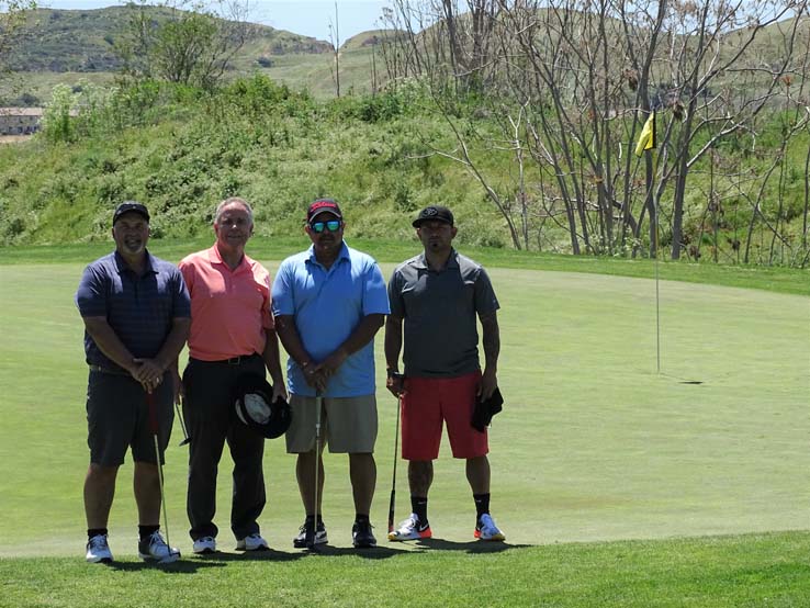 People enjoying the Fire Academy Golf Tournament