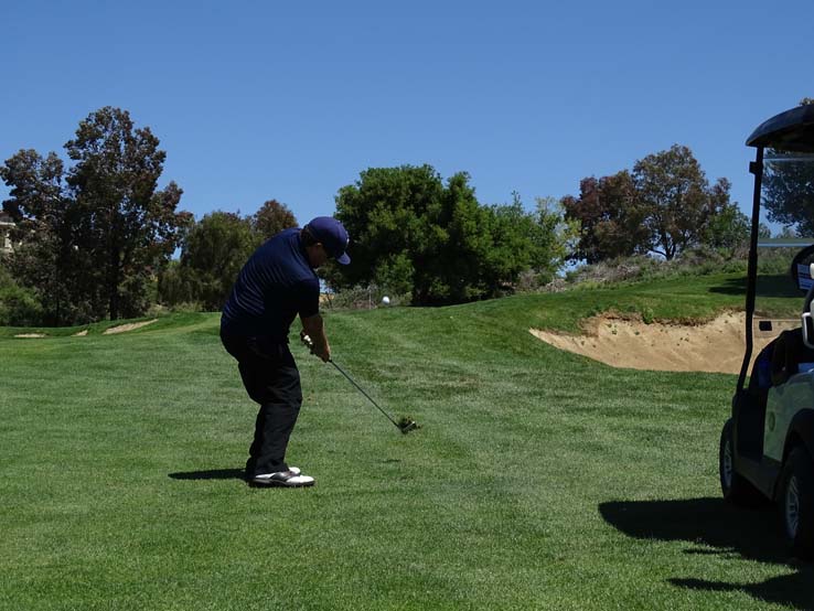 People enjoying the Fire Academy Golf Tournament