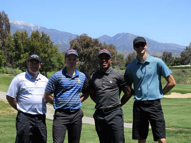 People enjoying the Fire Academy Golf Tournament