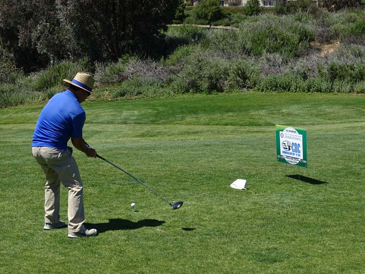 People enjoying the Fire Academy Golf Tournament