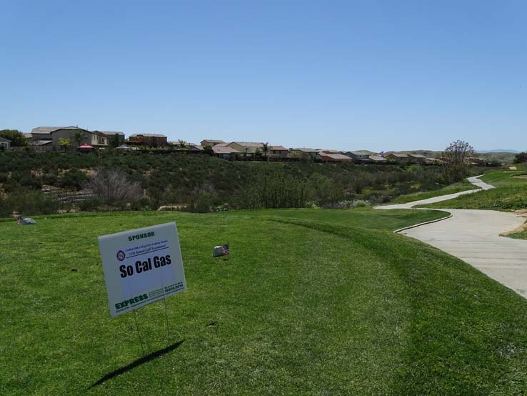 People enjoying the Fire Academy Golf Tournament