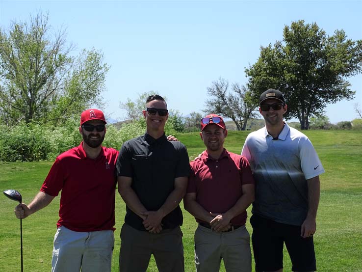 People enjoying the Fire Academy Golf Tournament