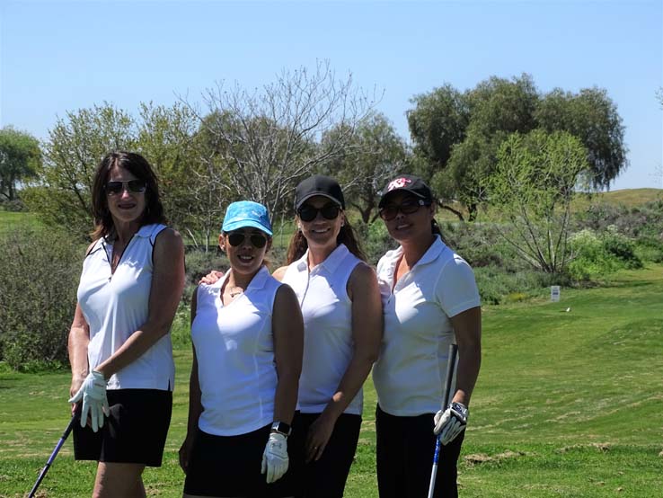 People enjoying the Fire Academy Golf Tournament