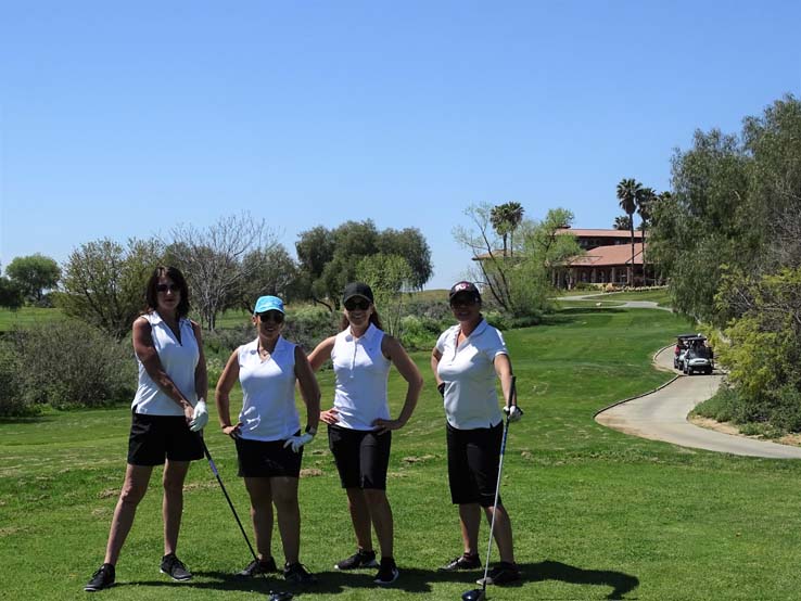 People enjoying the Fire Academy Golf Tournament