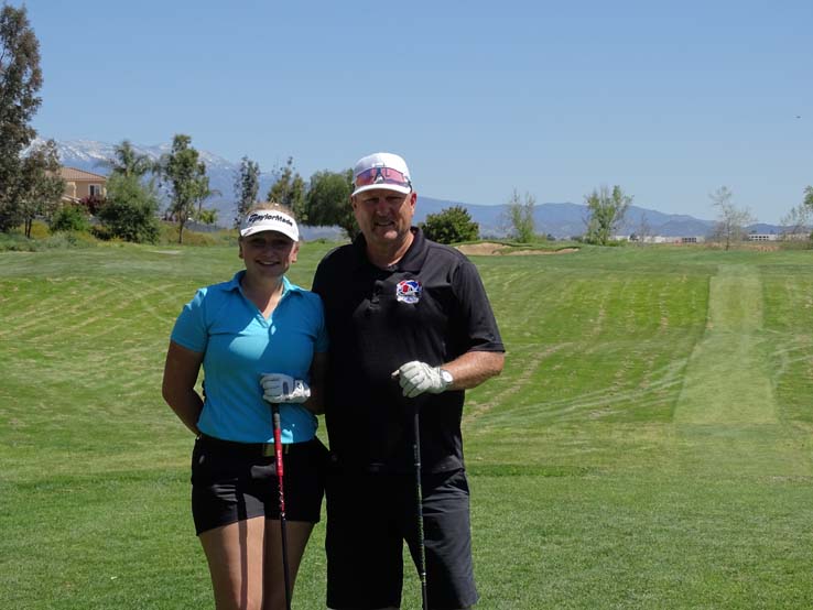 People enjoying the Fire Academy Golf Tournament