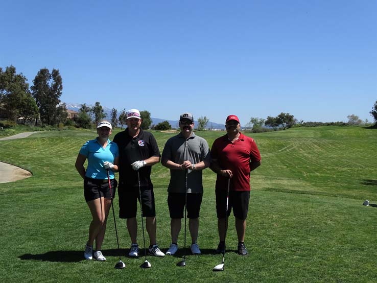 People enjoying the Fire Academy Golf Tournament