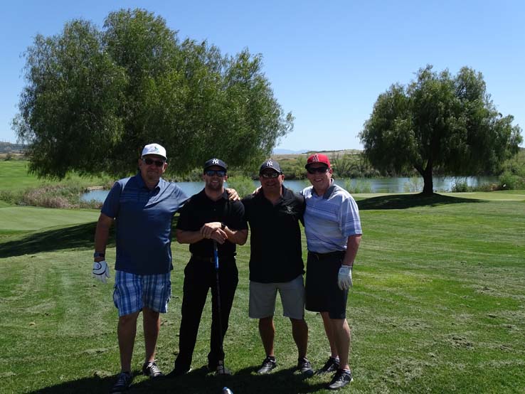 People enjoying the Fire Academy Golf Tournament