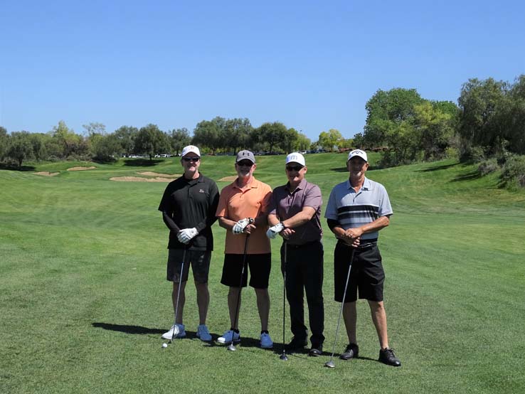 People enjoying the Fire Academy Golf Tournament