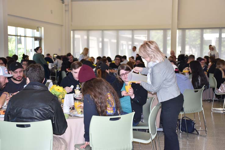 Students enjoying the grad breakfast