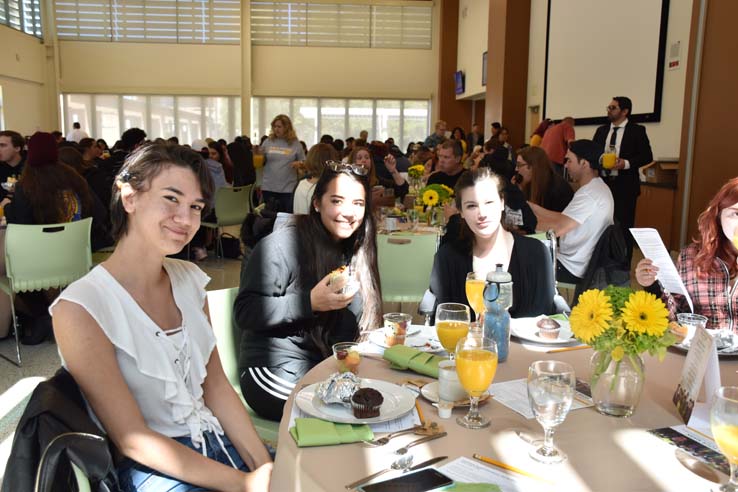 Students enjoying the grad breakfast