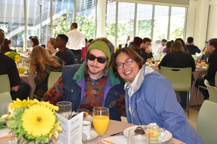 Students enjoying the grad breakfast