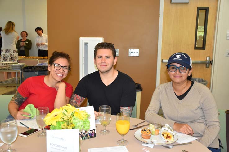 Students enjoying the grad breakfast