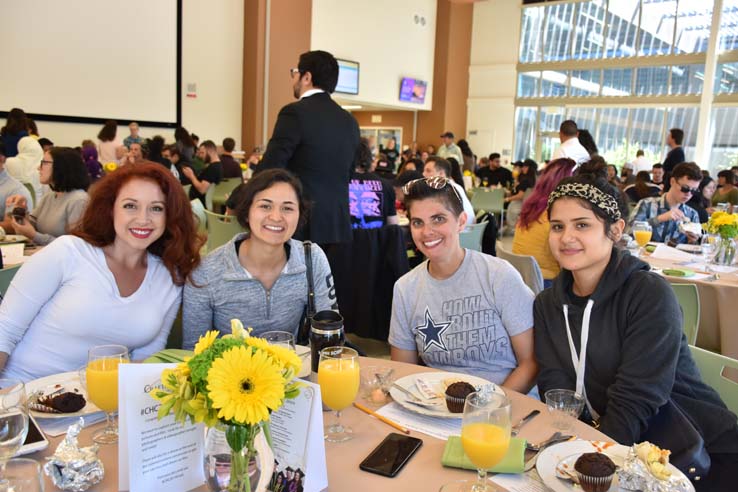 Students enjoying the grad breakfast