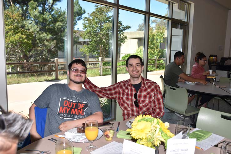 Students enjoying the grad breakfast