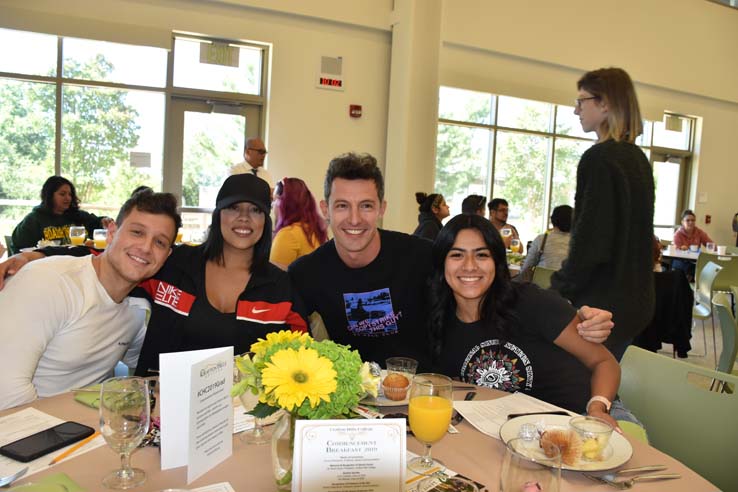 Students enjoying the grad breakfast