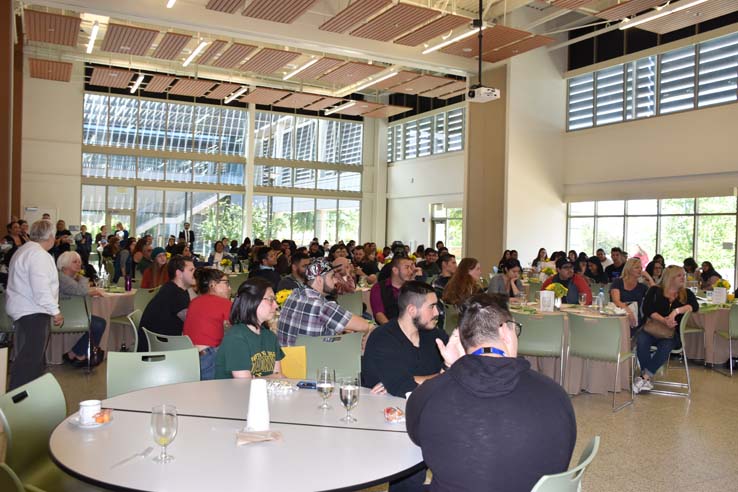 Students enjoying the grad breakfast