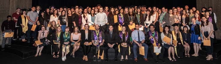 People enjoying Scholars Convocation