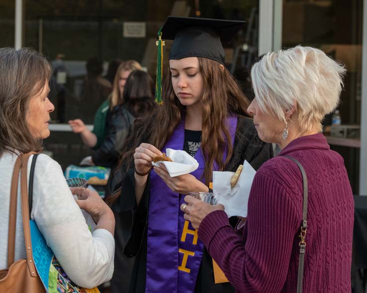 People enjoying Scholars Convocation