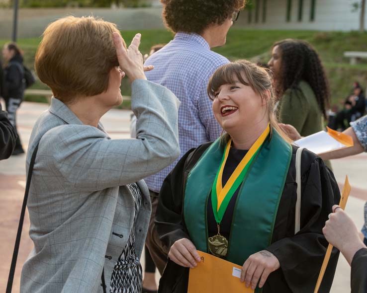 People enjoying Scholars Convocation