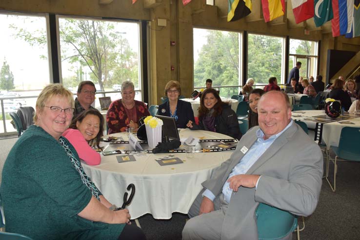 People enjoying the Transfer Luncheon