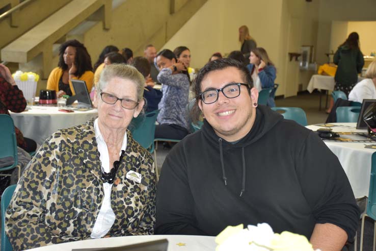 People enjoying the Transfer Luncheon