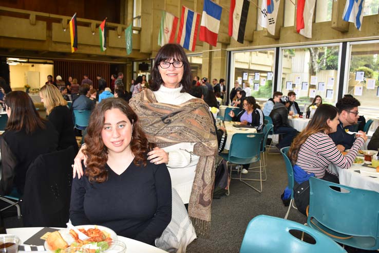 People enjoying the Transfer Luncheon