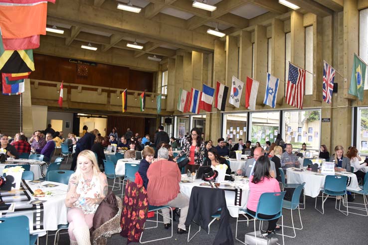 People enjoying the Transfer Luncheon