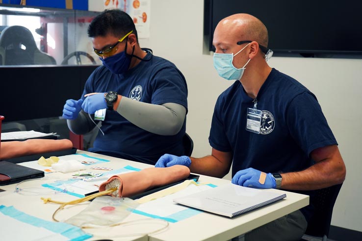 Paramedic students at education expo