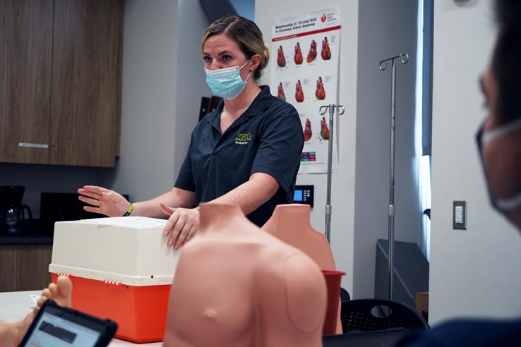 Paramedic students at education expo