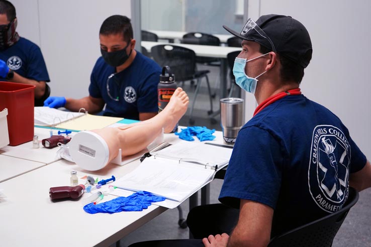 Paramedic students at education expo