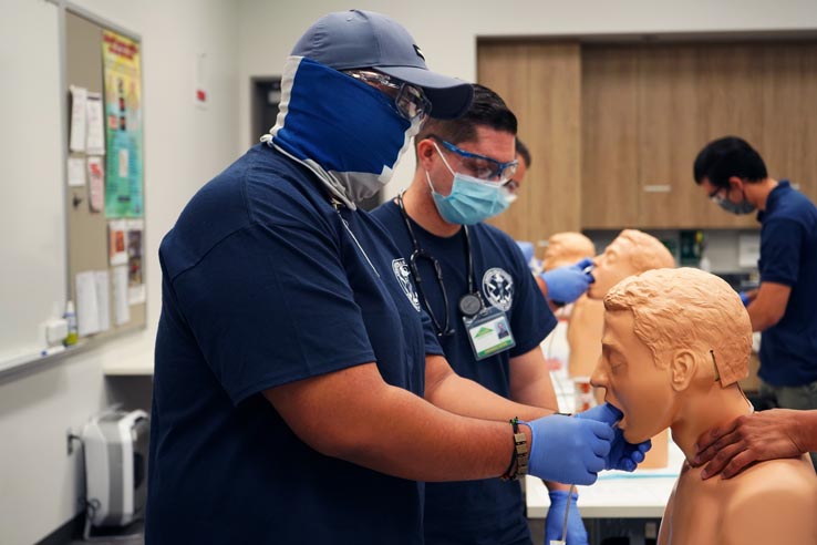 Paramedic students at education expo