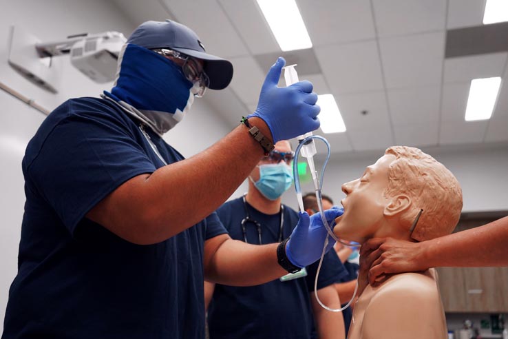 Paramedic students at education expo