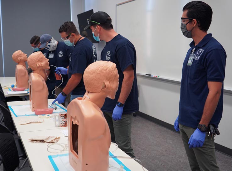 Paramedic students at education expo