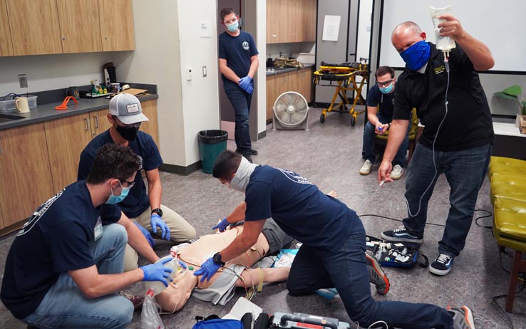 Paramedic students at education expo